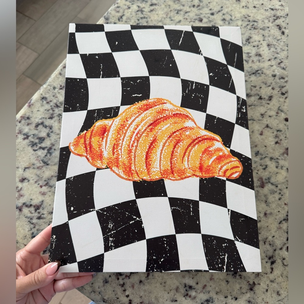 Checkered Canvas Art with Croissant Design